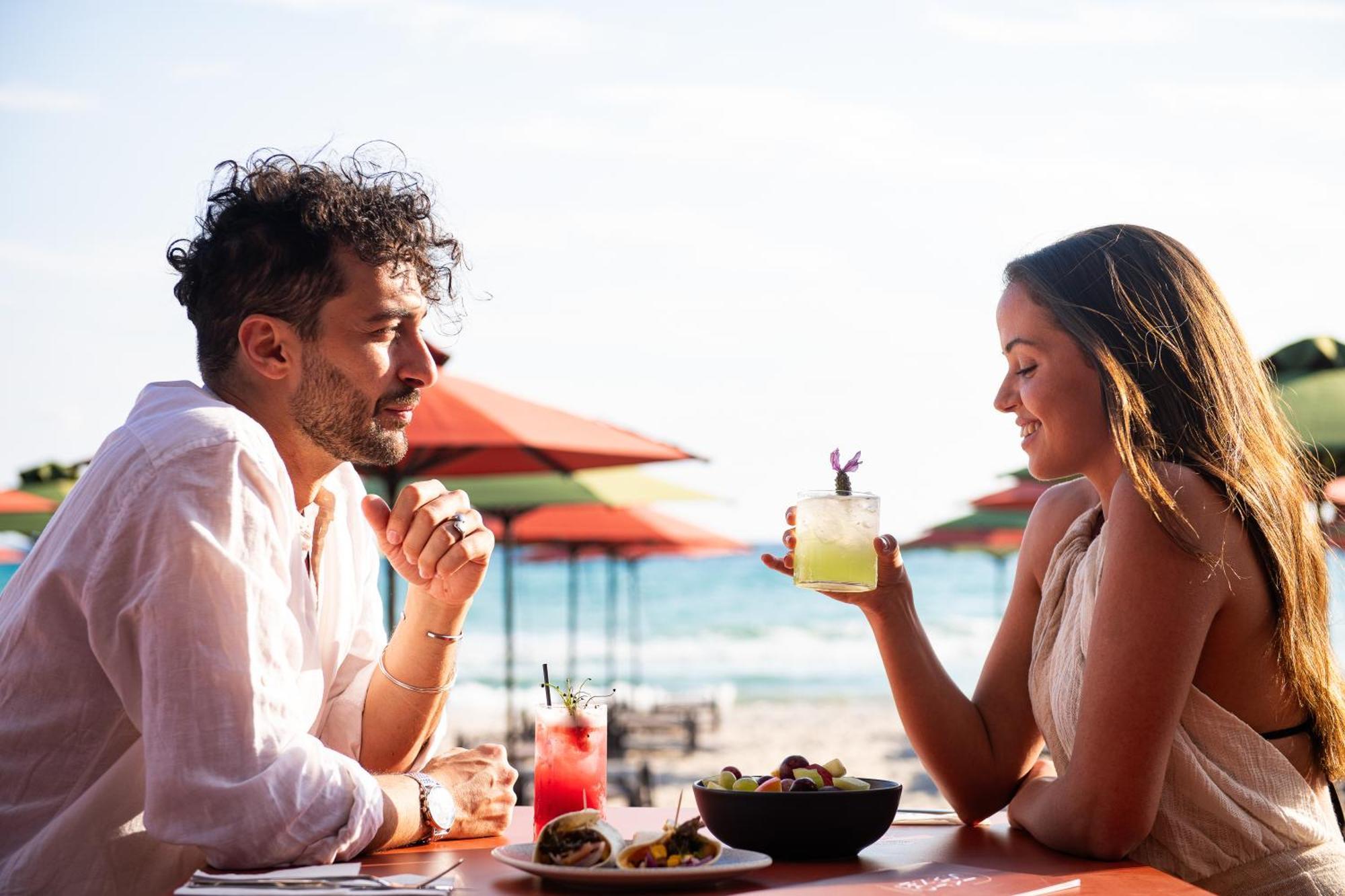 Simantro Resort Sani  Bagian luar foto A couple dining at a restaurant